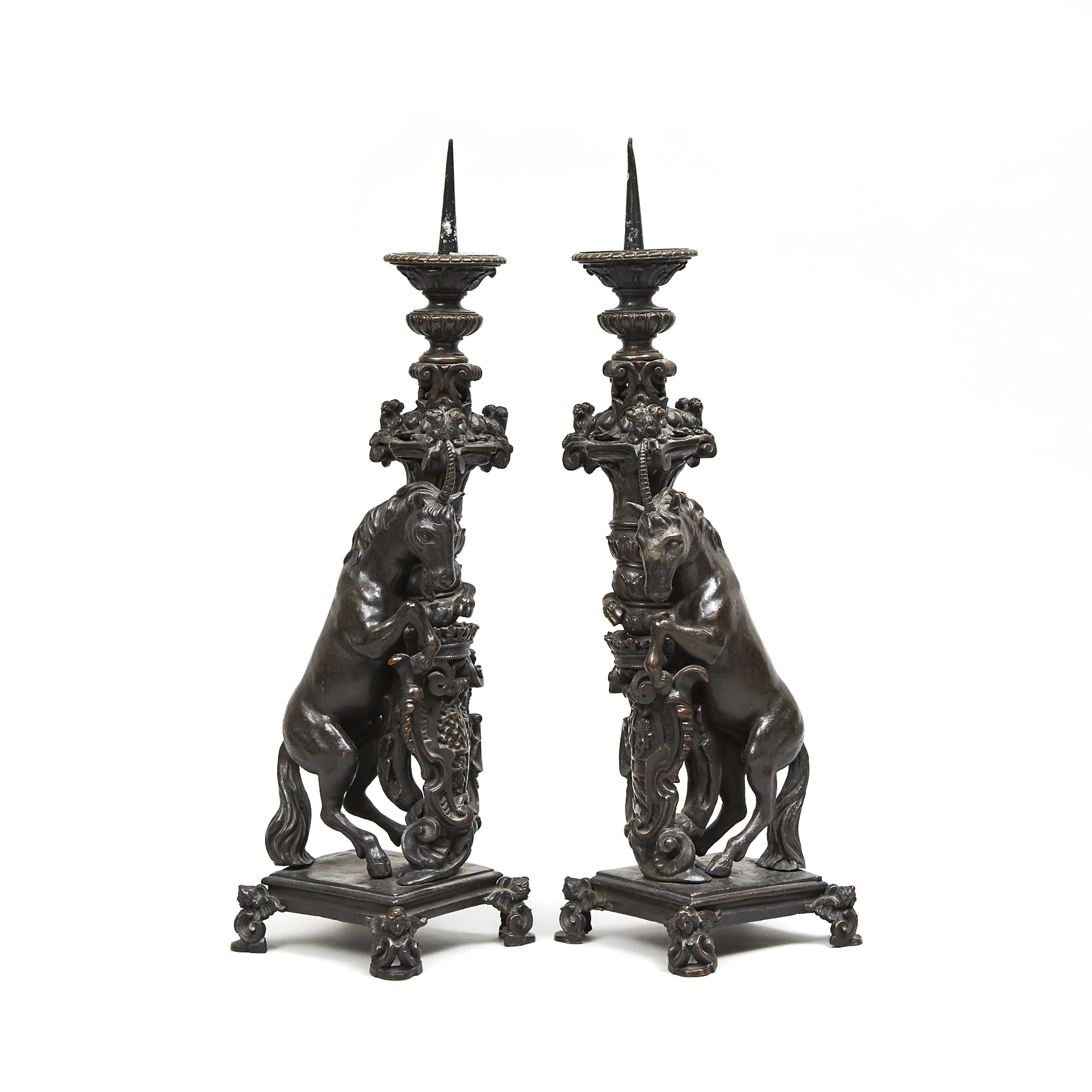 Pair of North Italian Renaissance Bronze Armourial Pricket Candlesticks, 16th or early 17th century