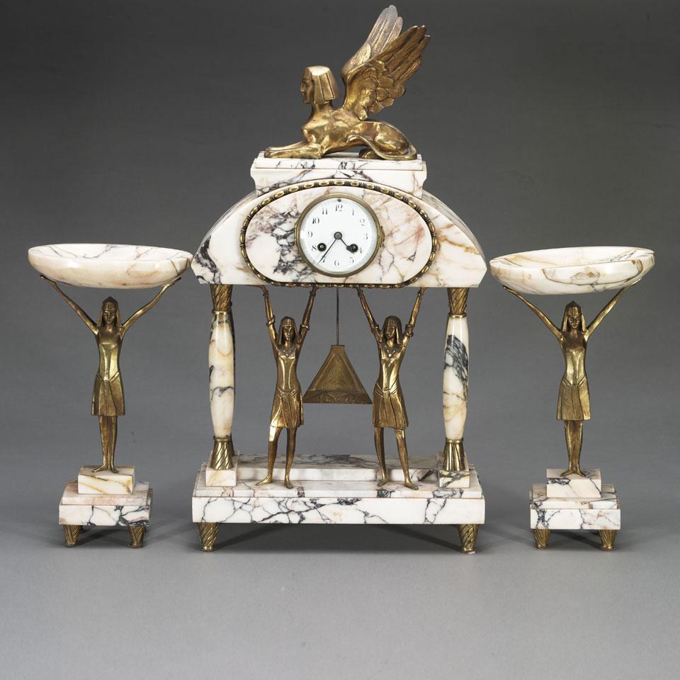 French Egyptian Revival Ormolu Mounted Crema Valencia Marble Clock Garniture, c.1925